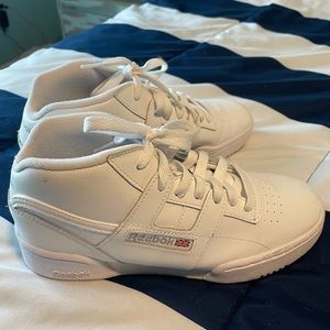 White high top Reebok shoes. Like New only Worn Twice.